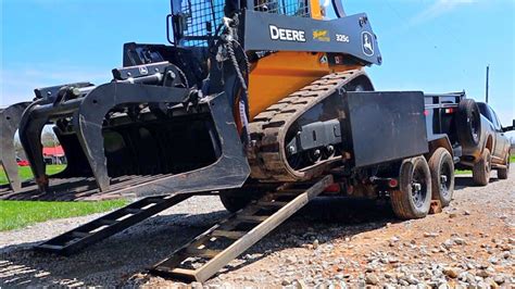 loading skid steer in back of dump trailer|bumper pull skid steer trailer.